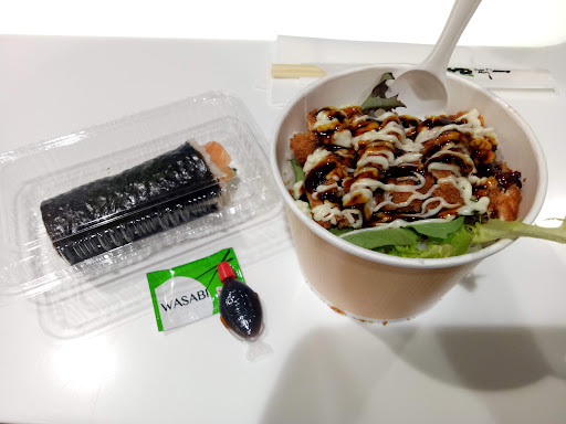 Takeaway rice bowl with sauce from Sushi Paradise